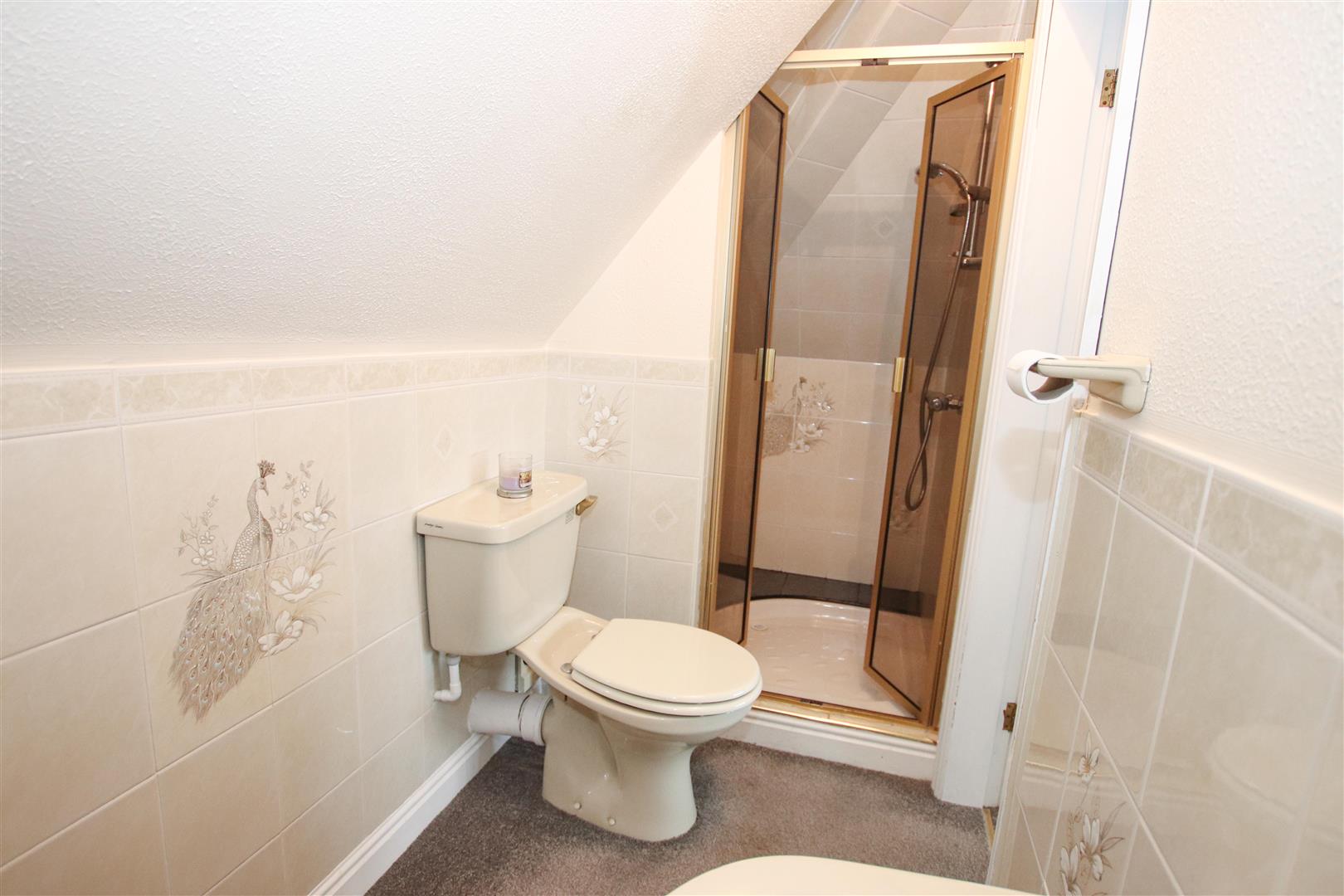 EN-SUITE SHOWER ROOM